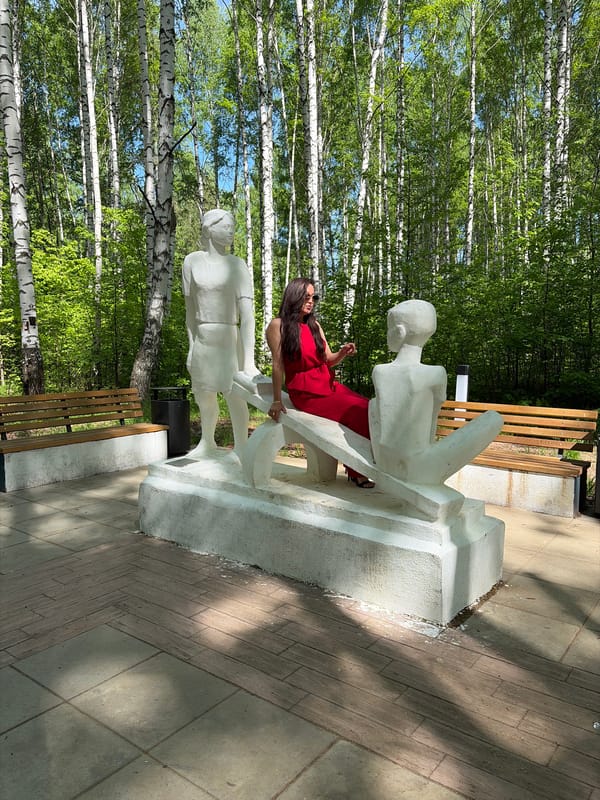 Woman in red spotted across outdoor locations during morning