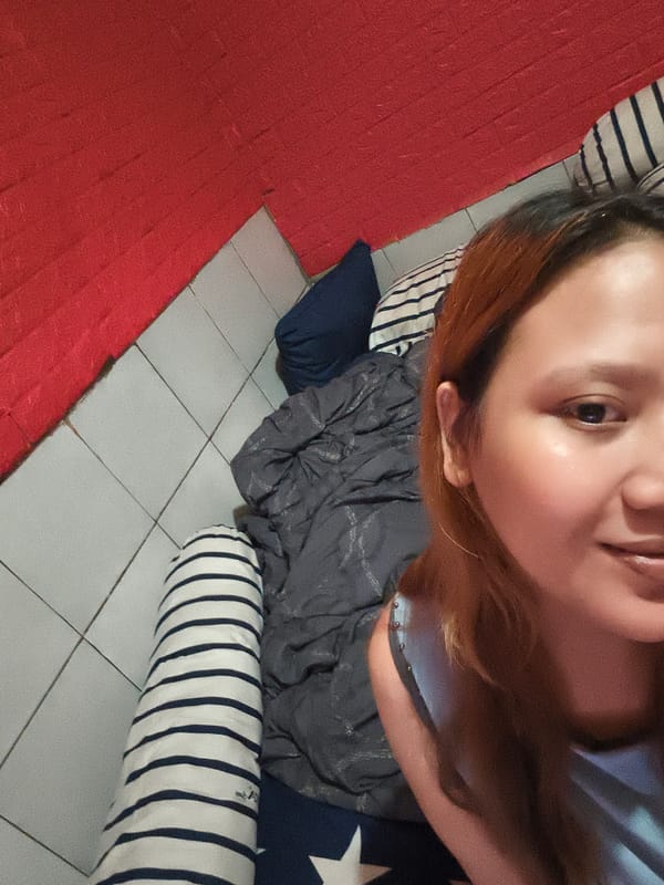 Woman photographed in Depok home while TV shows talk program