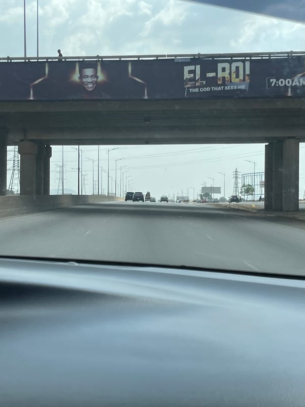 Billboard spotted near overpass in Galadimawa Village, Nigeria