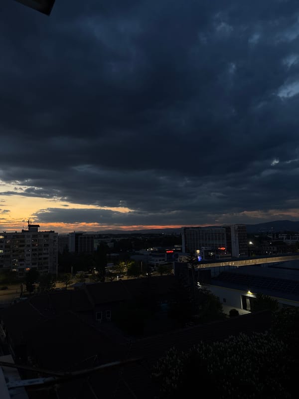 Evening cannabis session on Sofia balcony during storm