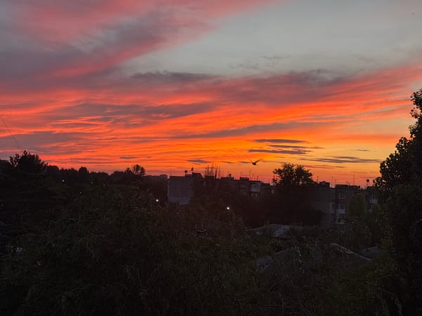 Fiery sunset sky over the city of Kamianske, Ukraine