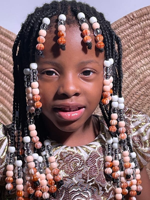Young girl photographed at chess event in Jos, Nigeria