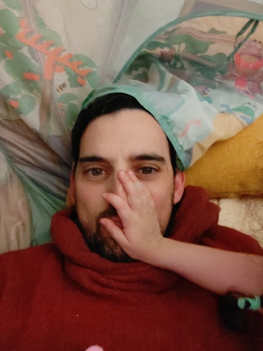 Man and child observed in domestic setting, Al Jizah