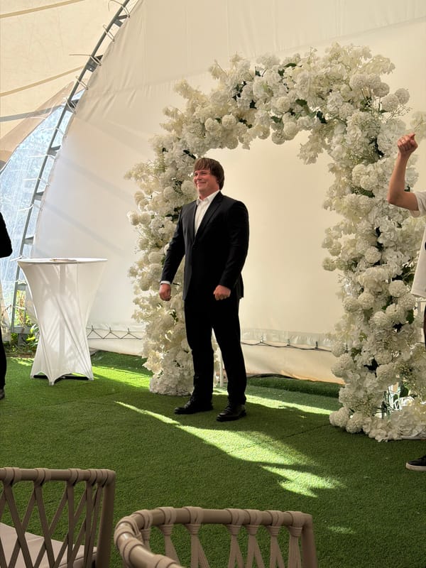 Outdoor wedding ceremony under white tent in Pavlodar, Kazakhstan