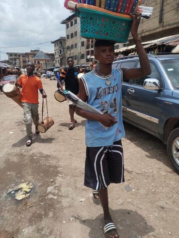Morning street life documented in Fegge, Nigeria neighborhood