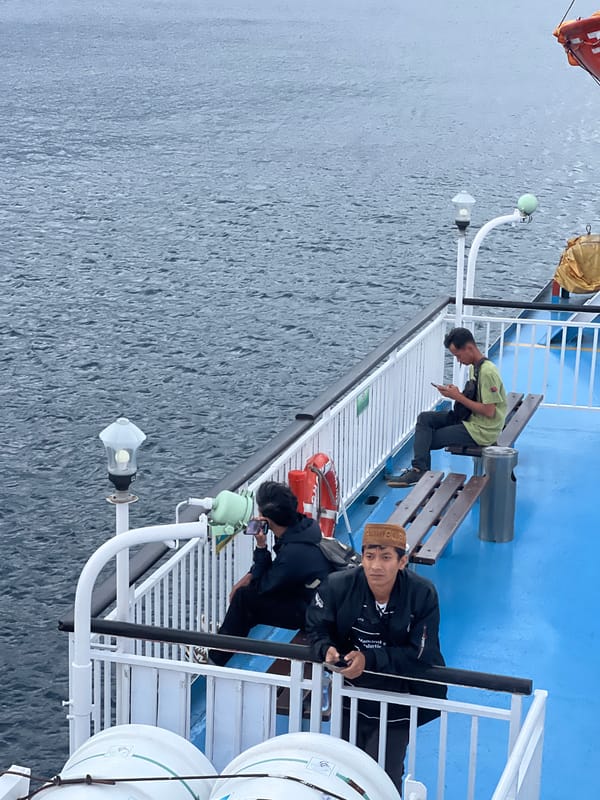 Ferry crossing documented near Ketapang, Indonesia under cloudy skies