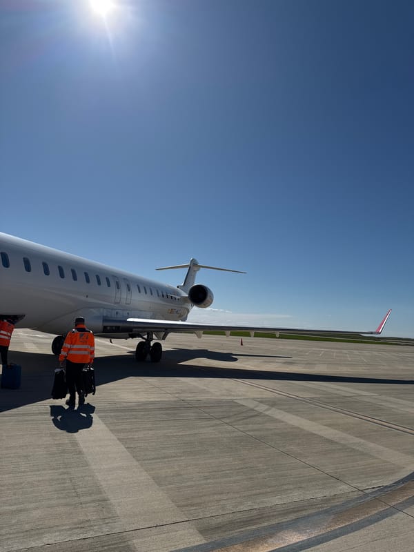 Ground crew loads passenger aircraft at Spanish regional airport