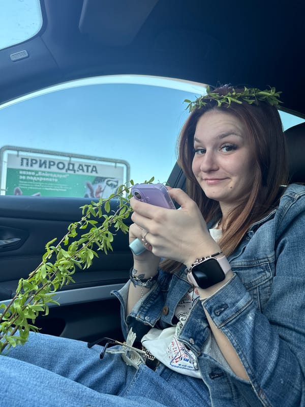 Woman in floral crown photographed in Sofia residential area