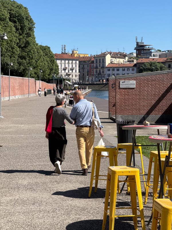 Afternoon leisure activities documented along Milan's Naviglio Grande canal