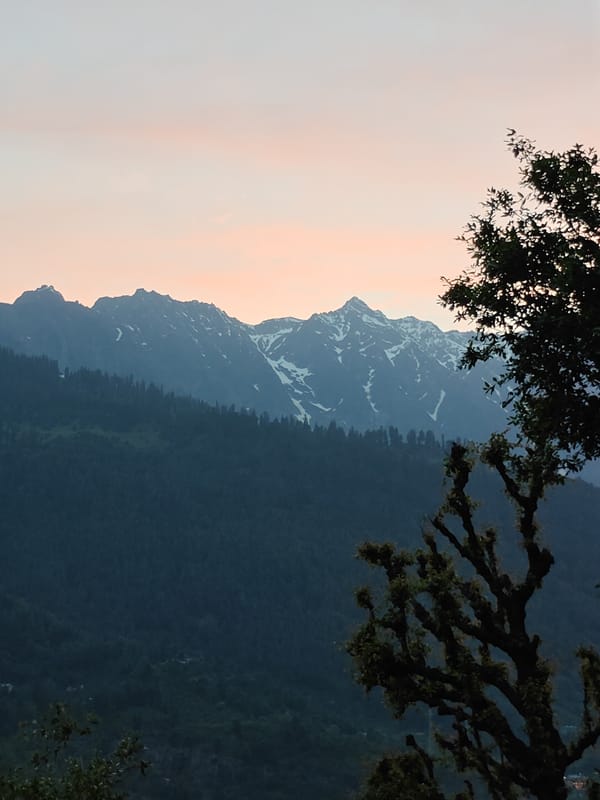 Mountain vistas and trail markers observed in Vashisht, India