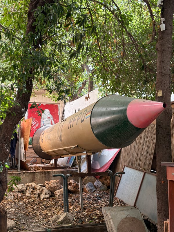 Haifa street-level scenes: missile display, playground, and subway station