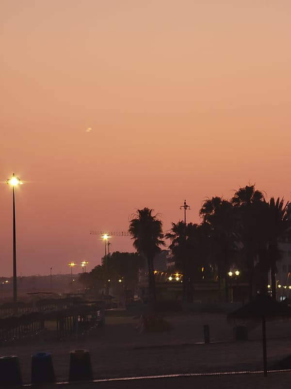 Evening beach scenes documented across Quarteira, Portugal coastline