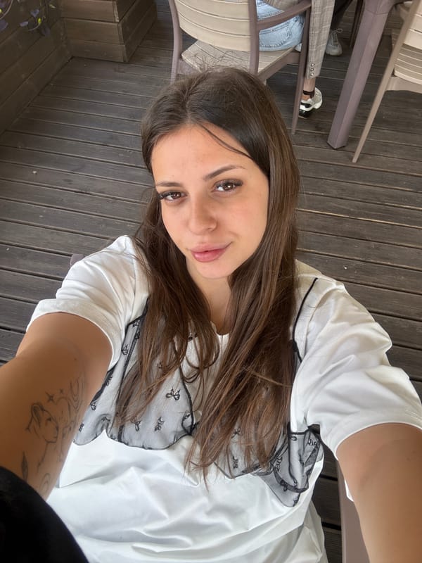 Woman documents morning cafe visit with baby in Velingrad
