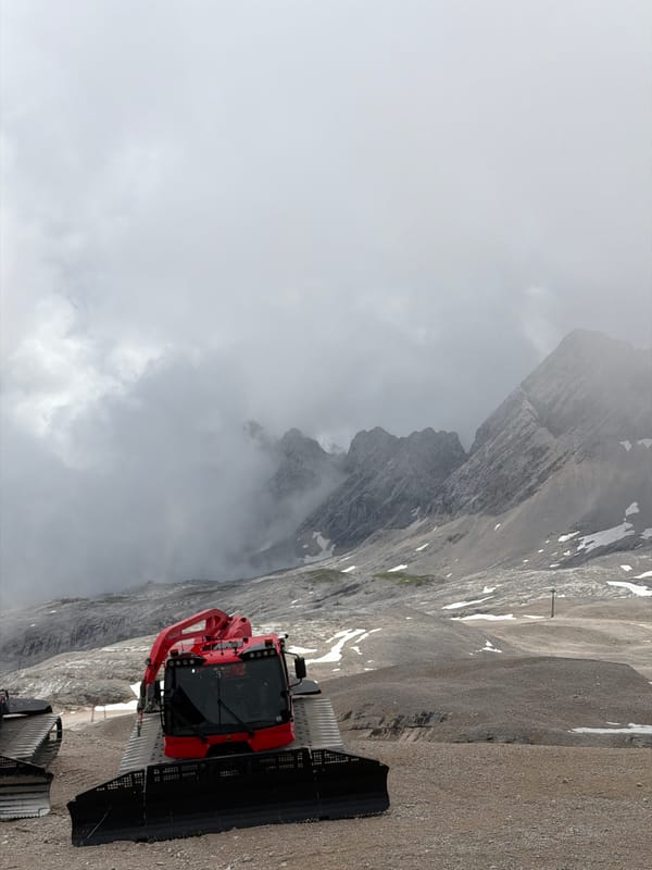 Foggy summer morning at a high Alpine summit in Garmisch-Partenkirchen
