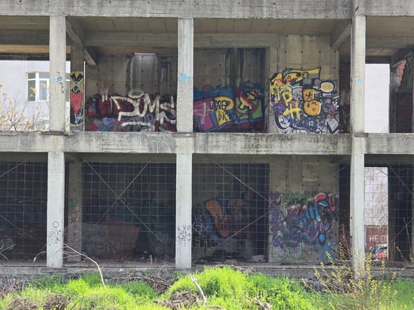 Abandoned building with graffiti documented by witness