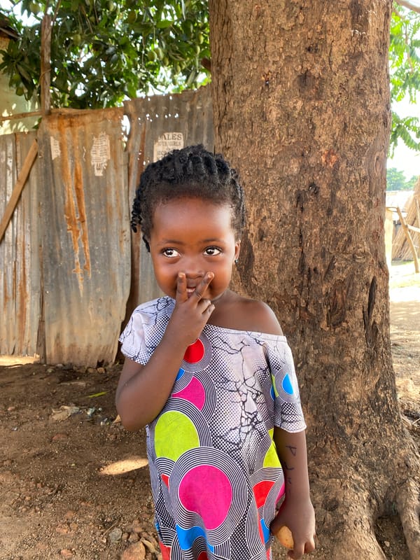 Child photographed in joyful portraits in Kuru Dungus, Nigeria