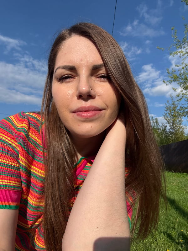Woman documents springtime family moments in Russian village playground