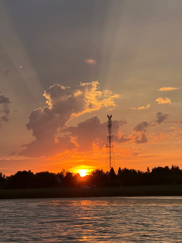 Sunset over the water in Novopichugovo, Russia