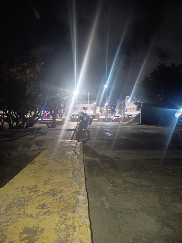 Nighttime waterfront scenes across Juan Griego, Venezuela
