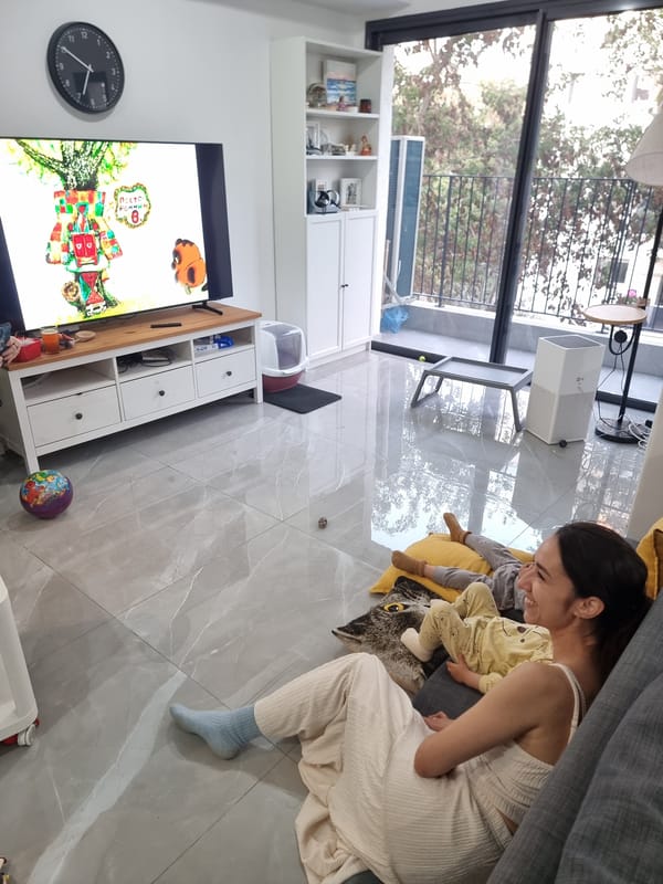 Family gathering with buffet spread observed in Bat Yam