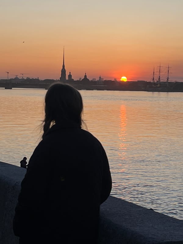 Sunset fishing and contemplation along Saint Petersburg waterfront
