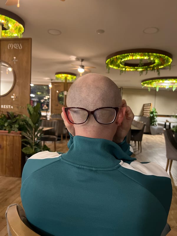 Restaurant gathering and construction activity documented in Montenegro coastal towns