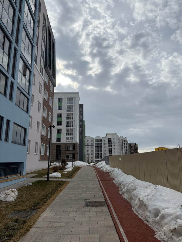 Woman documents early morning selfie session in Russian residential area