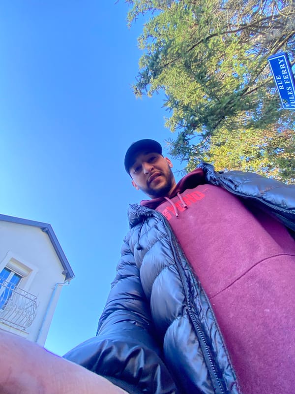 Person takes multiple selfies in Bischheim, France