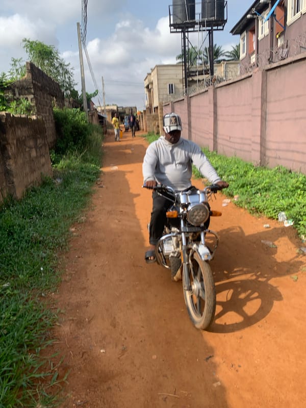 Motorcycle activity observed on dirt road in Ukwu-Abwa, Nigeria