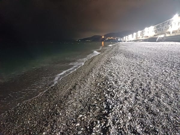 Nighttime scenes captured at empty Sochi pebble beach