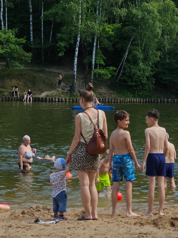 Lazy summer morning at a Moscow lakeside beach