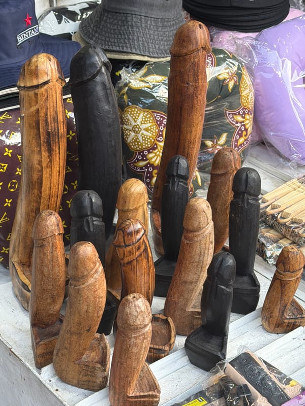 Morning stroll through Kuta's souvenir stalls, shrines, and street scenes