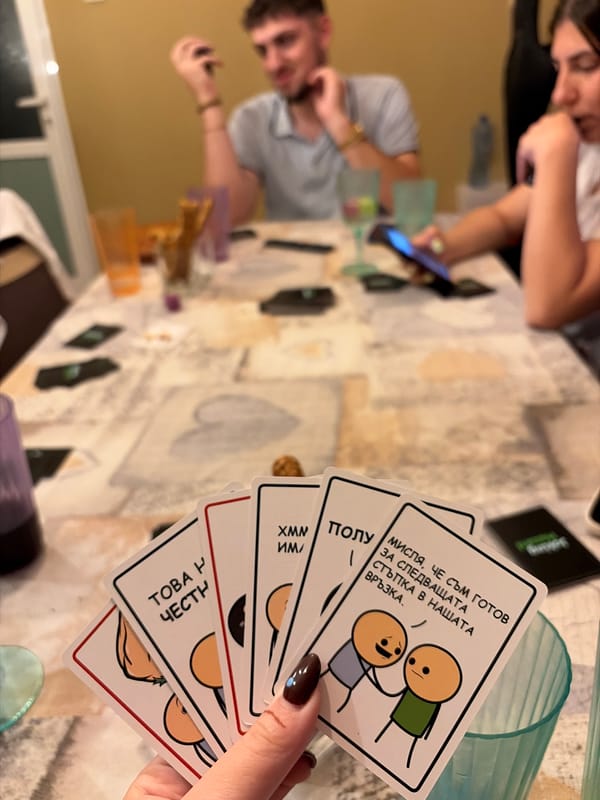 Friends play Joking Hazard card game in Plovdiv home