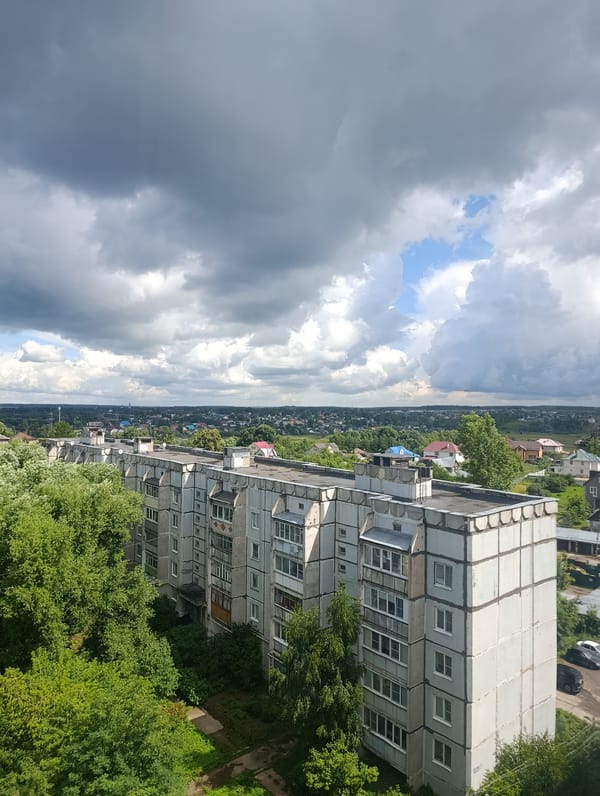 Aerial sweep of Soviet-era housing and outskirts in Alexandrov, Russia