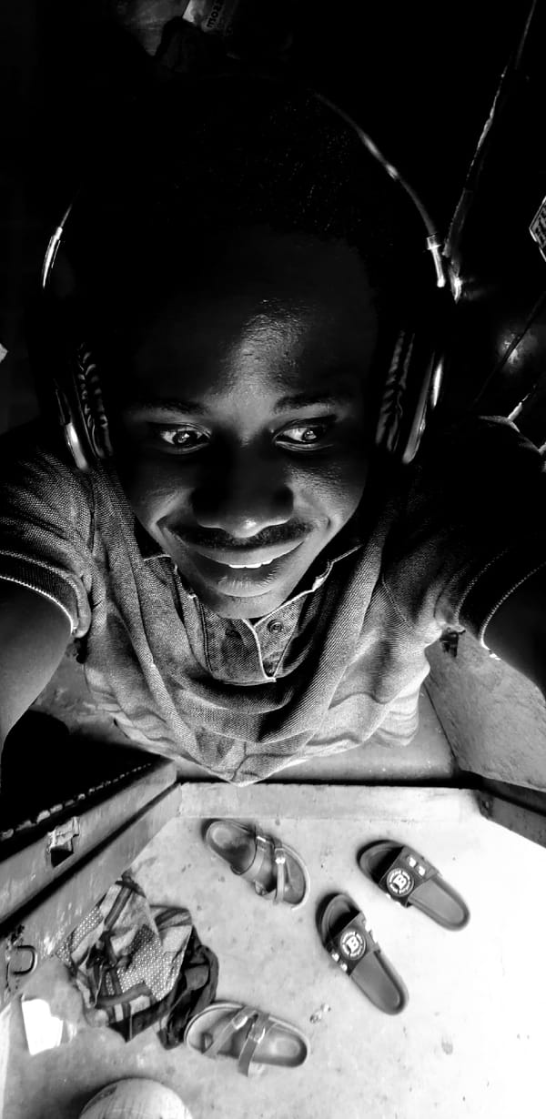 Headphone portraits and a street moment in Narayi, Nigeria
