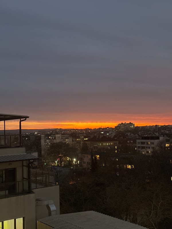 Evening sunset observed over Varna cityscape from elevated viewpoint