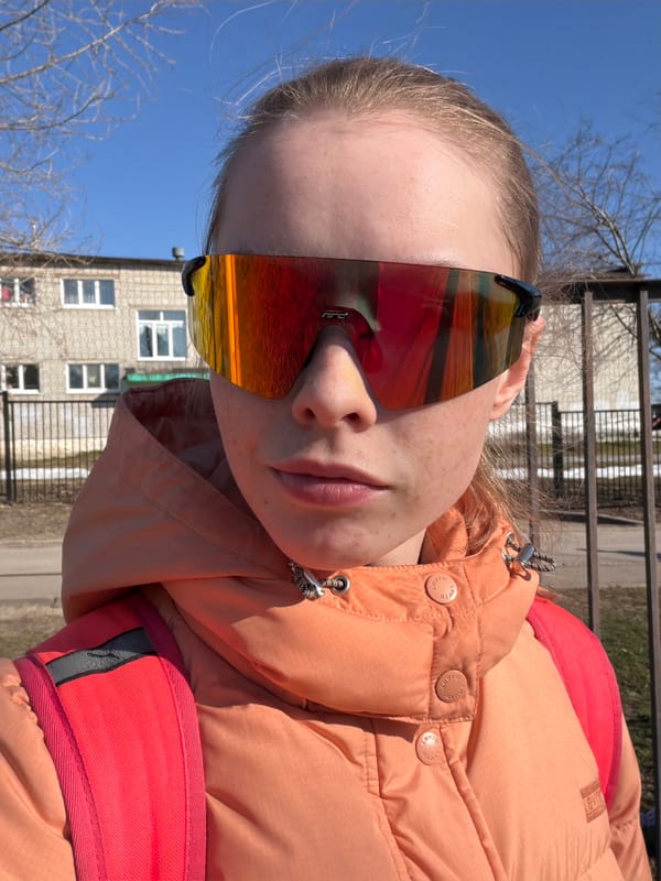 Person in orange goggles, peach jacket photographed in Berezniki