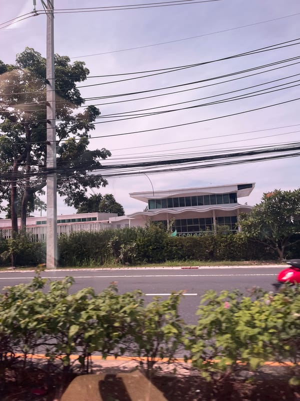 Routine street activity documented in Chalong, Thailand morning hours