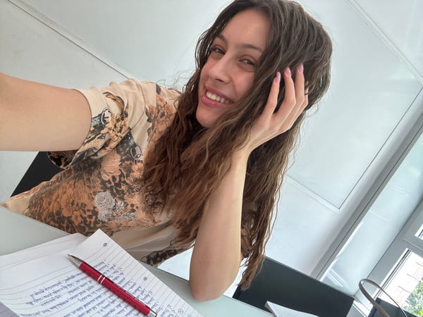 Student studies legal research at Bocconi University desk in Milan