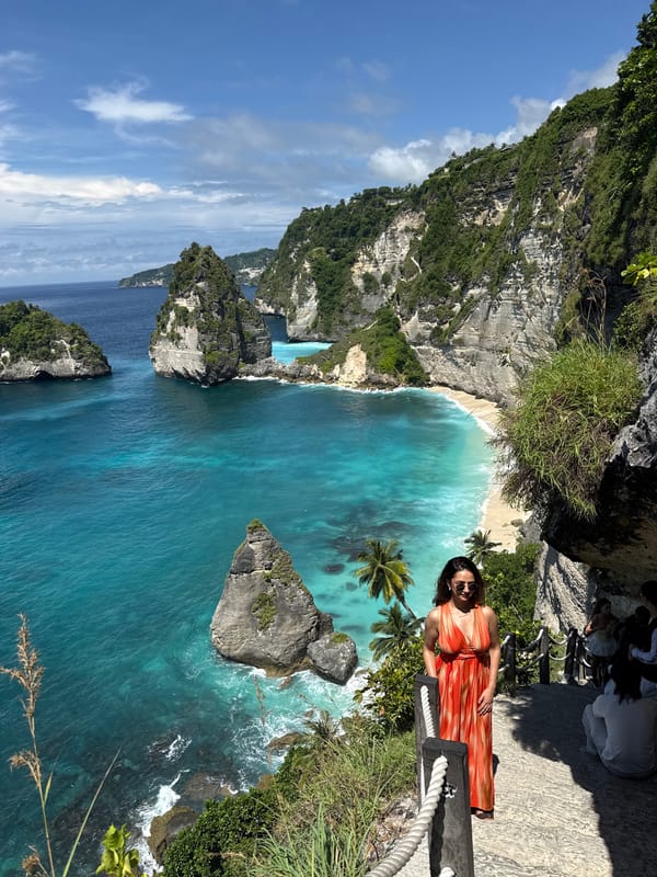 Tourists photograph iconic Kelingking Beach views in Nusa Penida