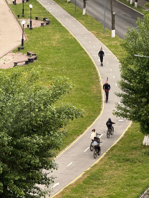 Early morning cyclists and scooter riders use Votkinsk pathway