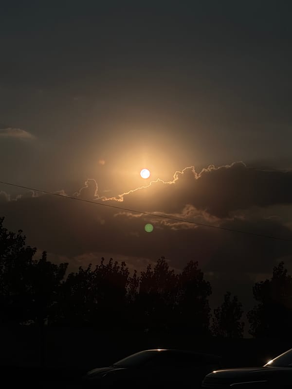 Halo sun at dusk over Tashkent's evening sky