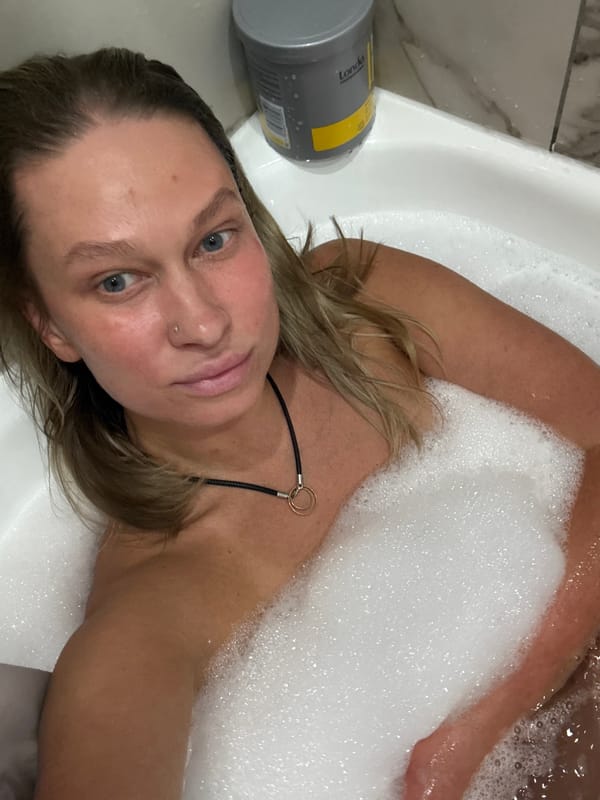 Woman enjoys bubble bath with bath bomb in Perm