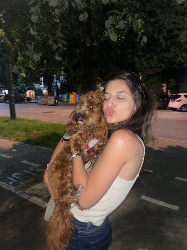 Evening dog walk and selfies near urban establishment