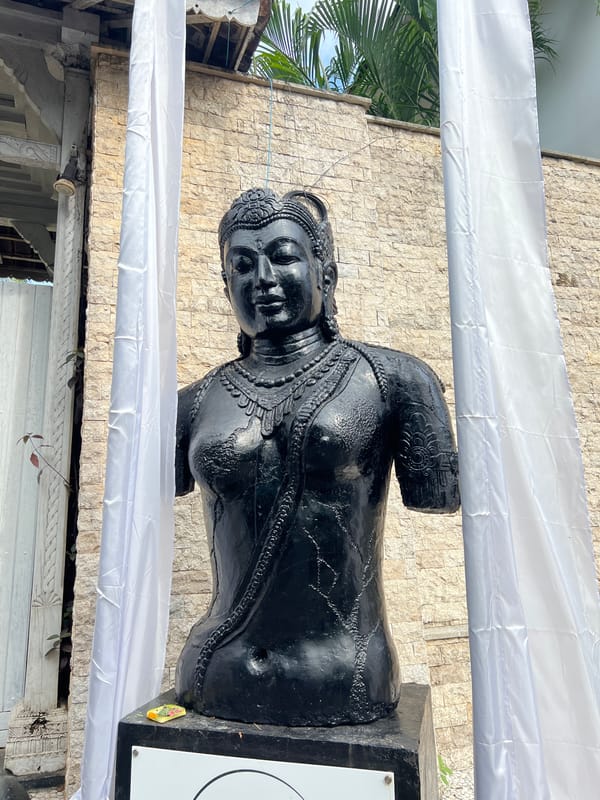 Witness documents statues and ocean views in Pecatu, Indonesia
