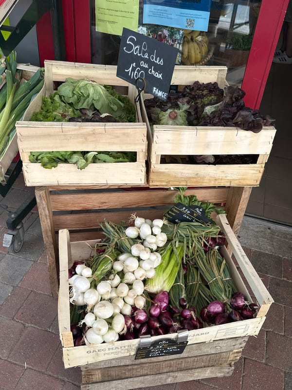 Morning market haul from a Normandy village, baguettes and all