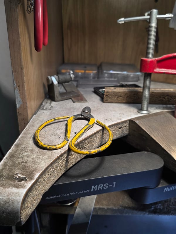 Jewelry craftsperson documents metalworking process in Kazan workshop