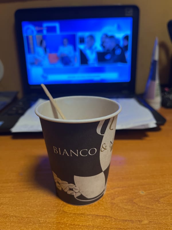Coffee cup and laptop news broadcast observed in Smolyan