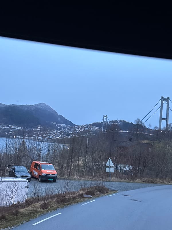 Morning view captures suspension bridge from Kleppestø window