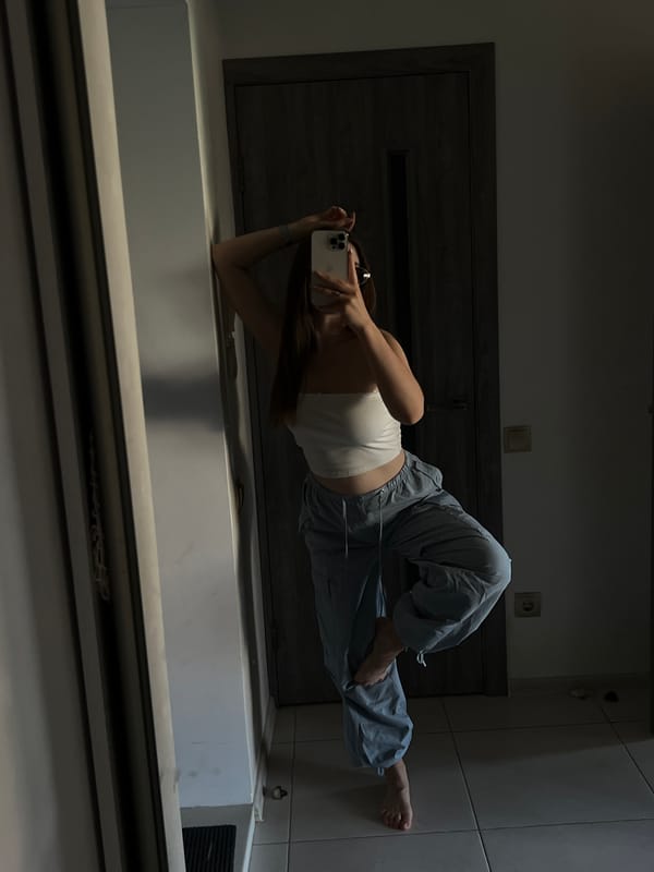 Mirror selfie session across rooms in a Ternopil apartment